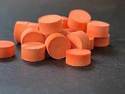 Pyrazolam Pellets in a lab container, available exclusively for professional research use at Psychedelic Schrooms.
